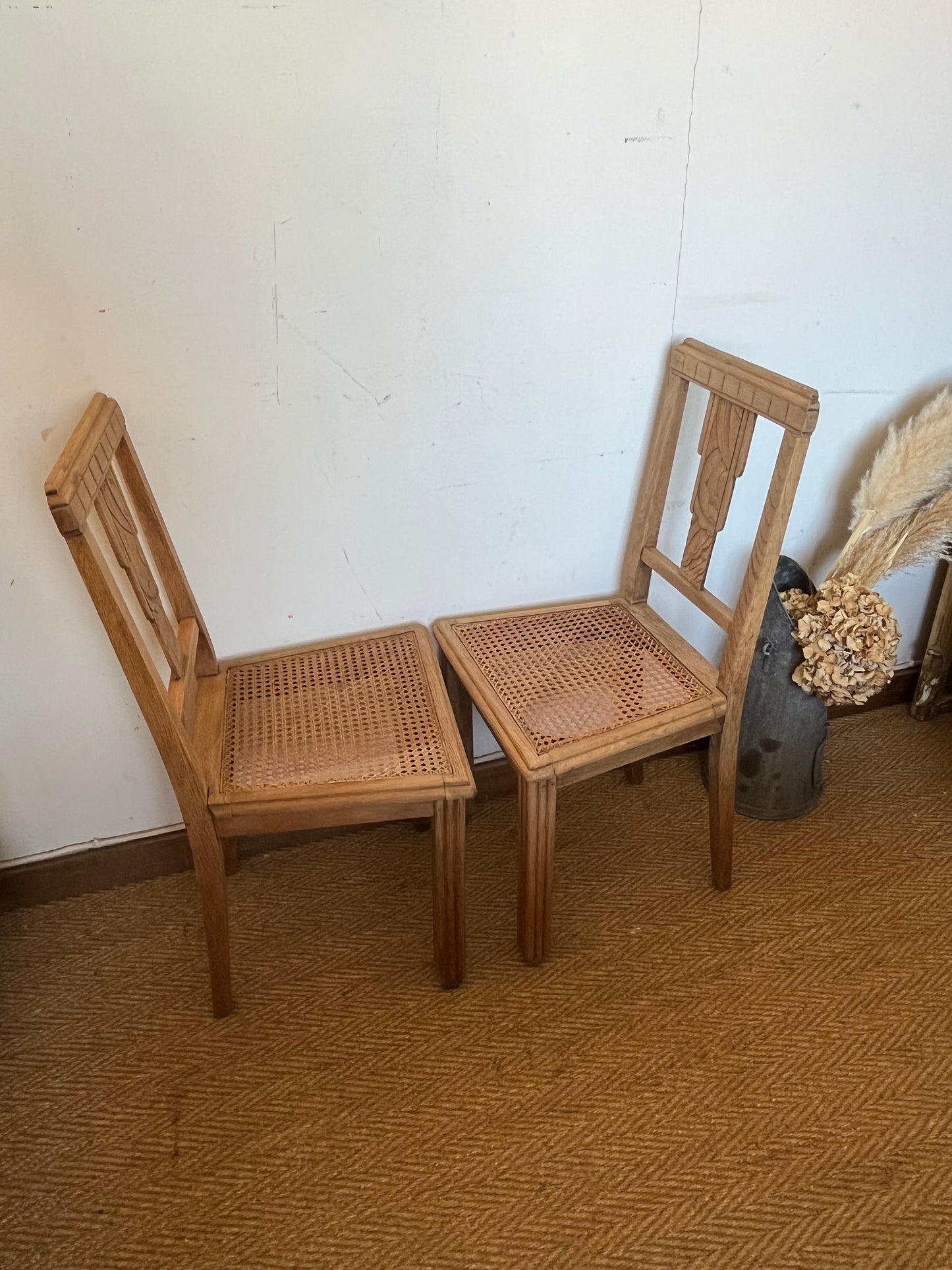 Paire de chaises art déco en chêne et cannage vintage