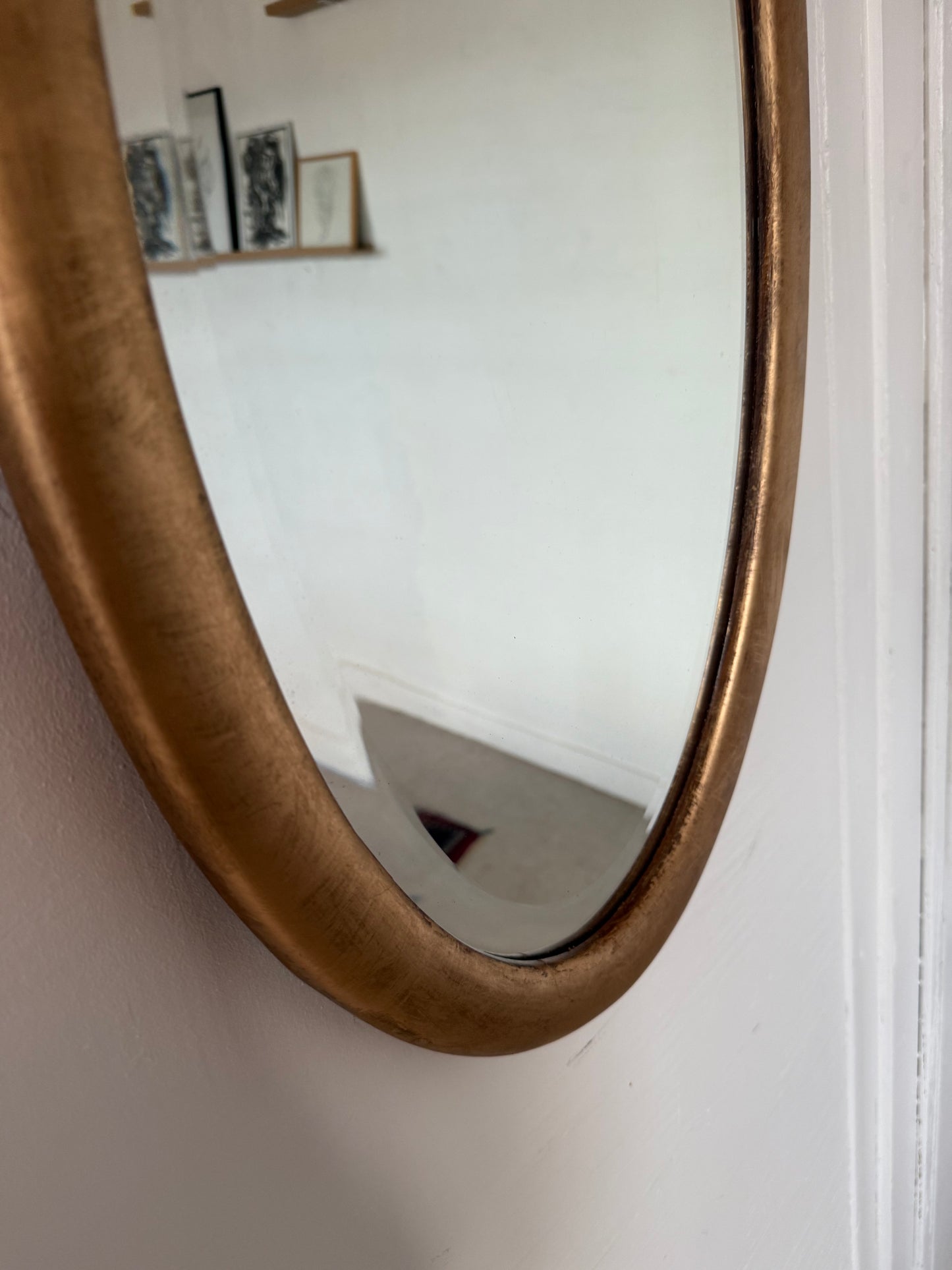 Miroir doré ovale ancien glace biseautée