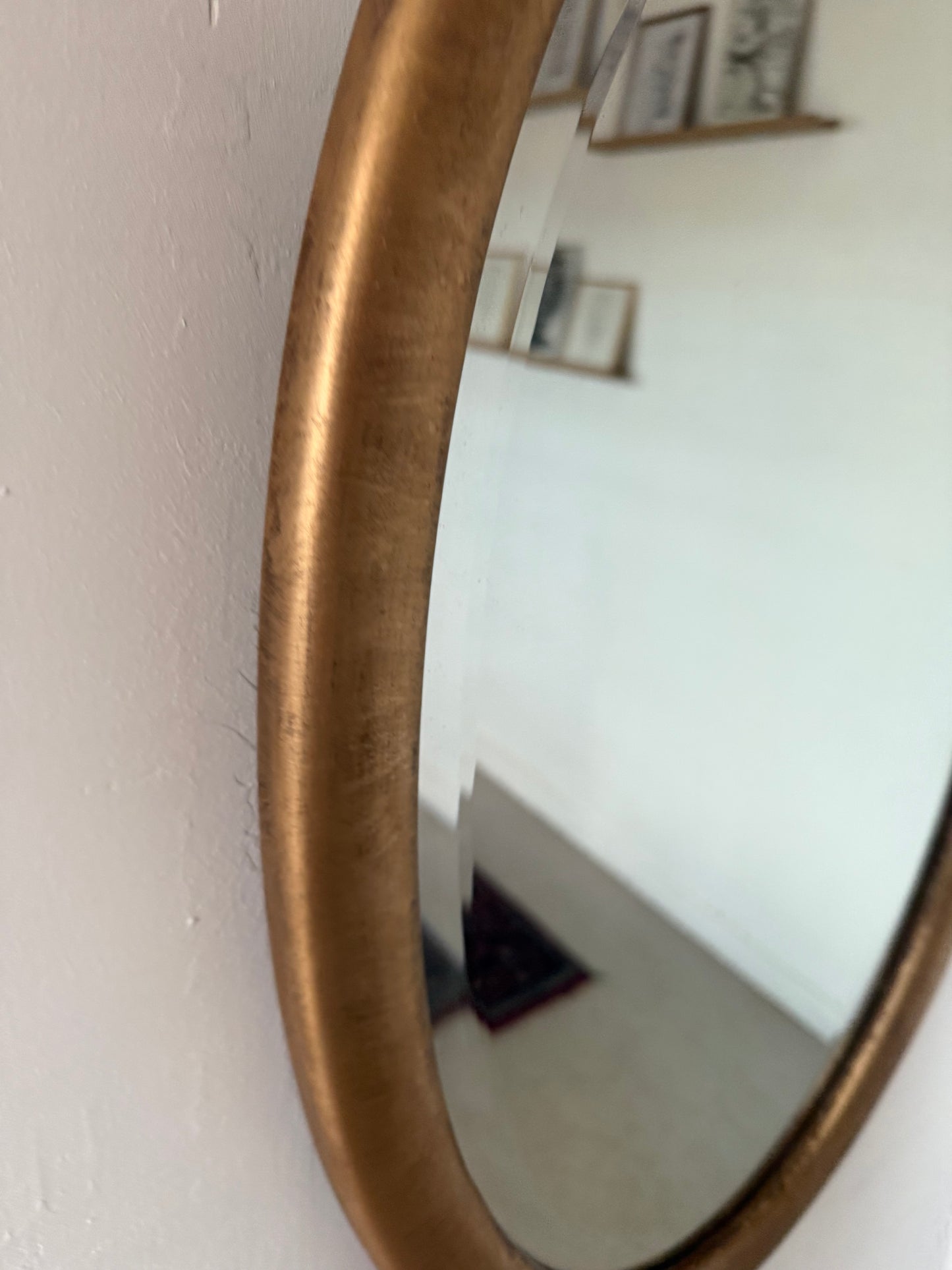 Miroir doré ovale ancien glace biseautée