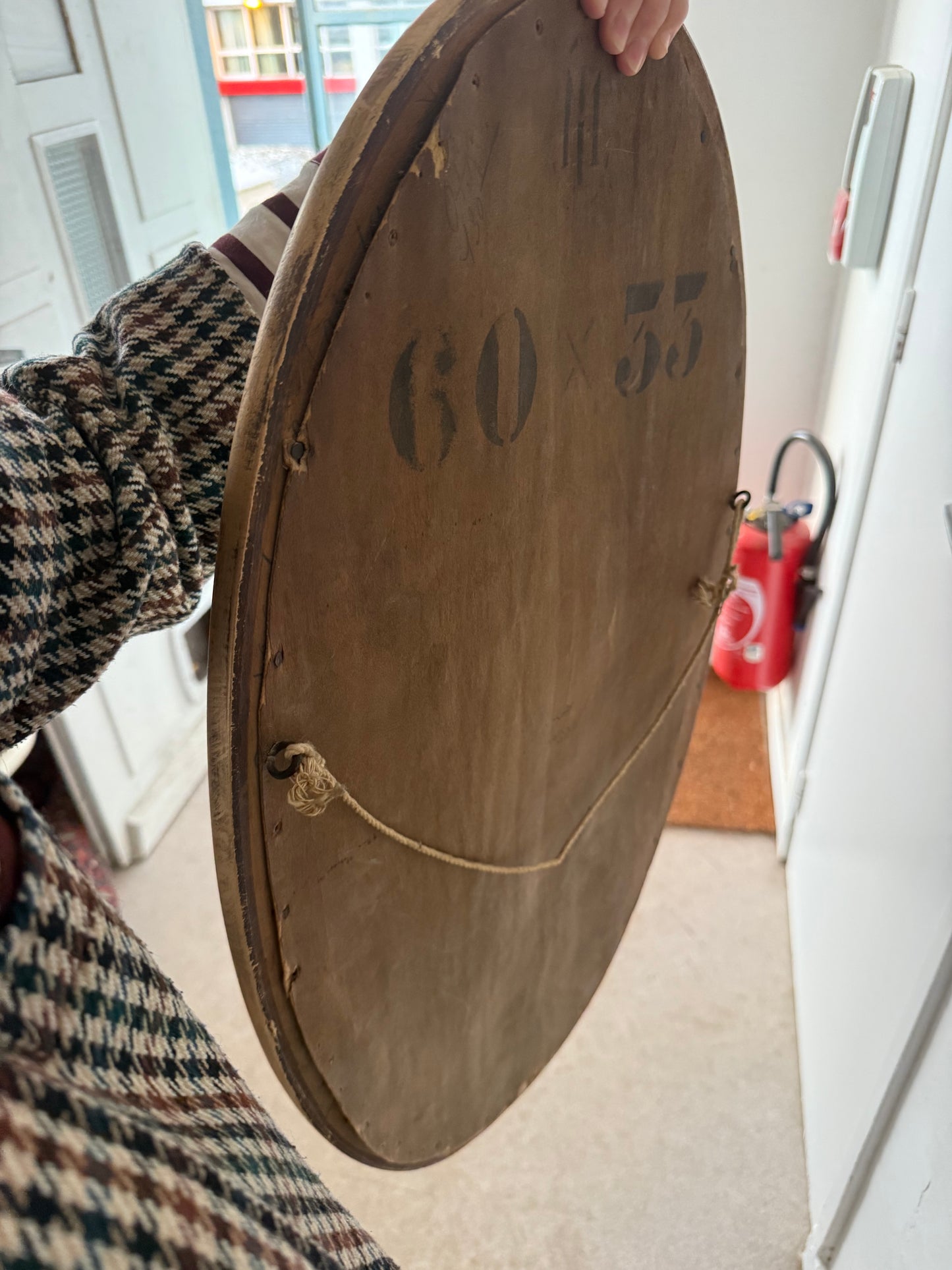 Miroir doré ovale ancien glace biseautée