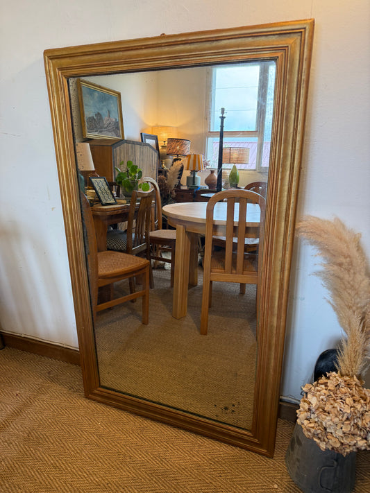 Grand miroir ancien en bois patiné doré