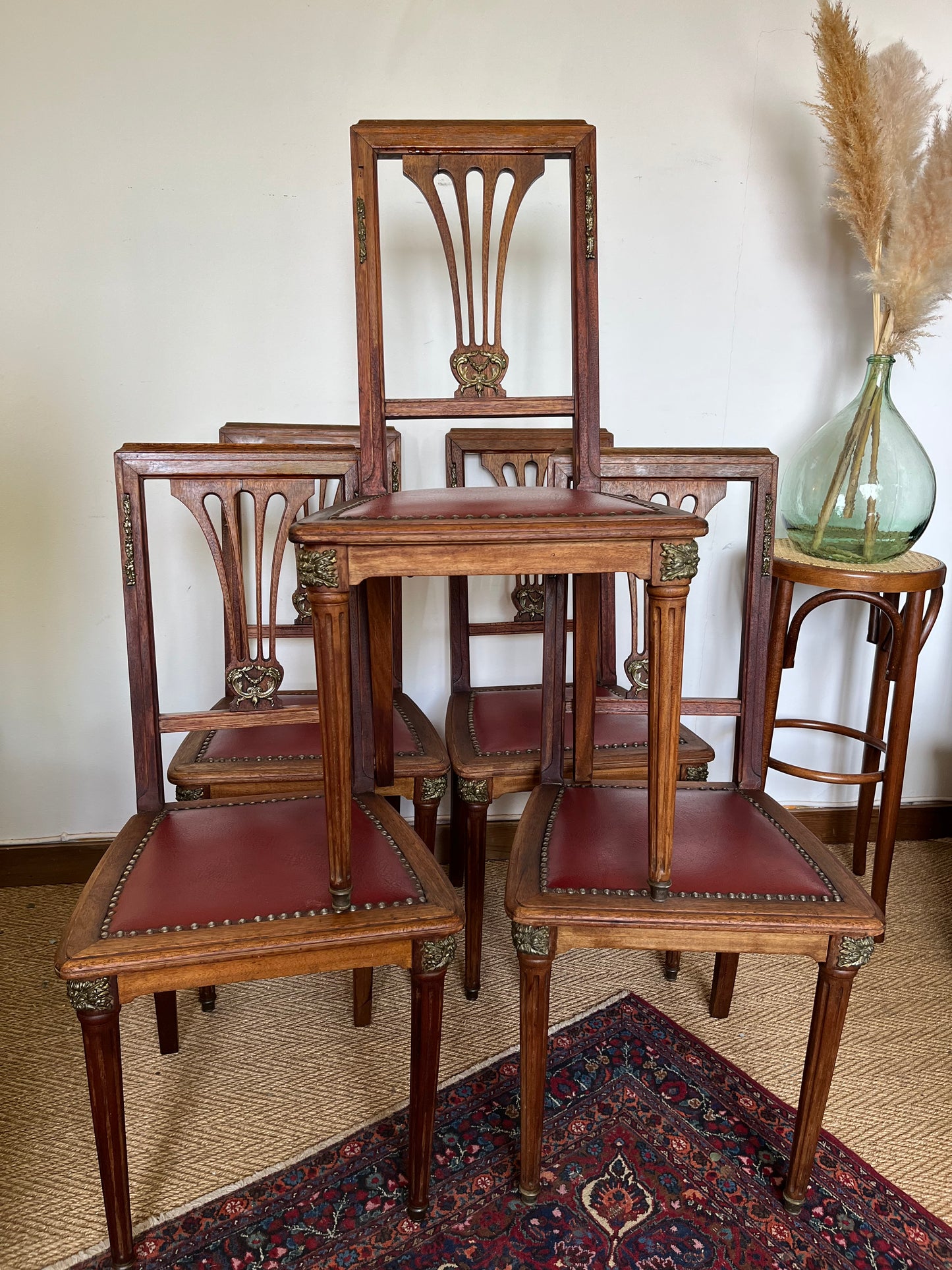 Chaises vintage bois et similicuir rouge