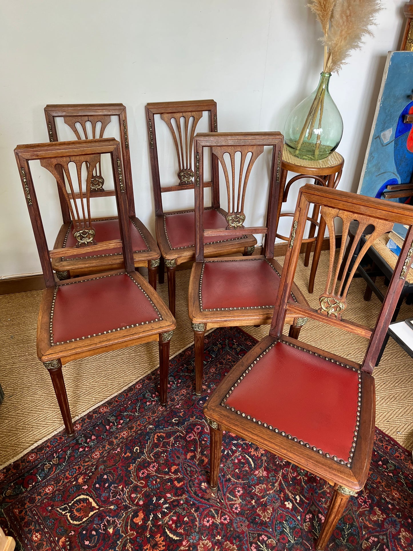 Chaises vintage bois et similicuir rouge