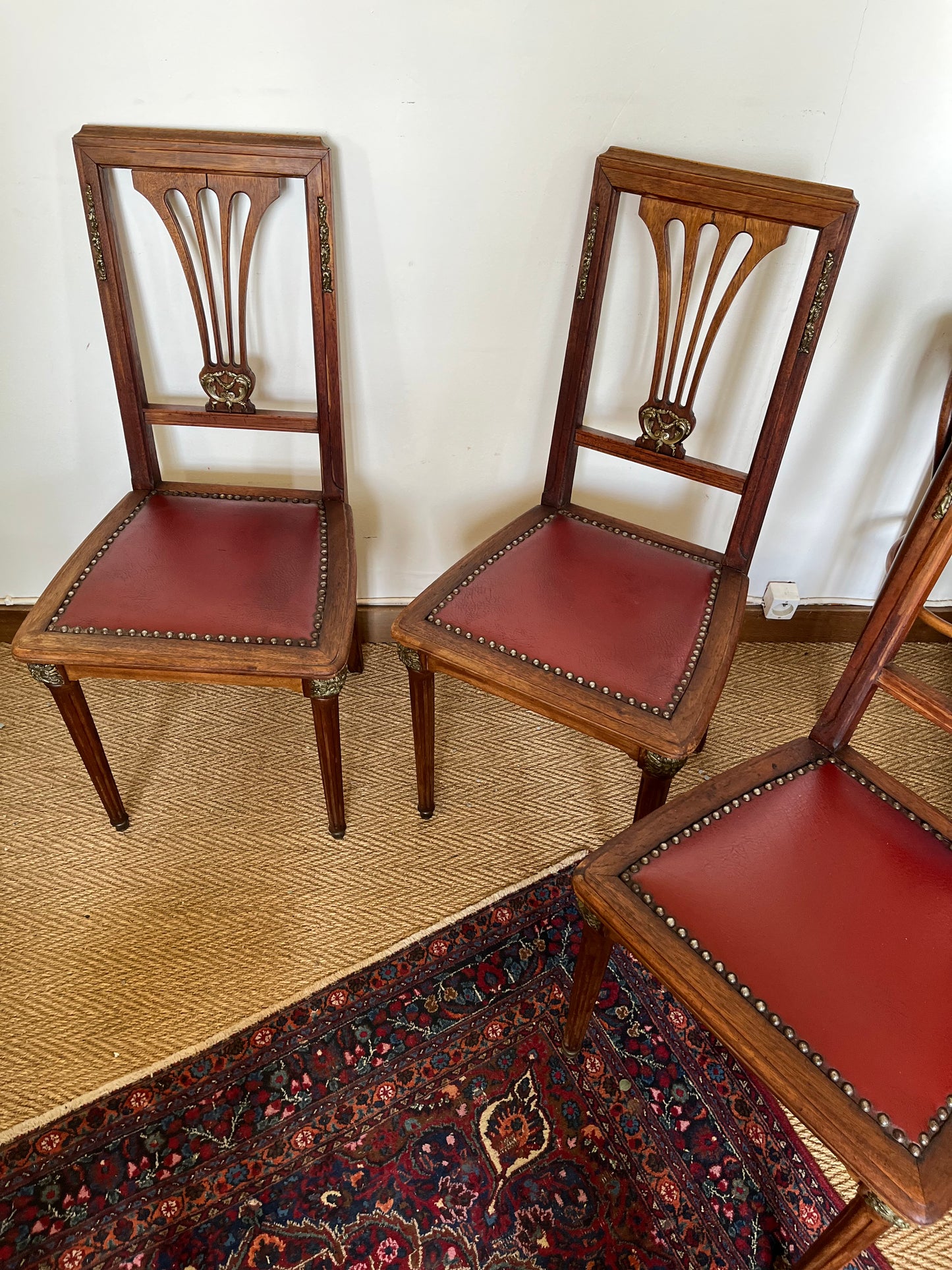 Chaises vintage bois et similicuir rouge