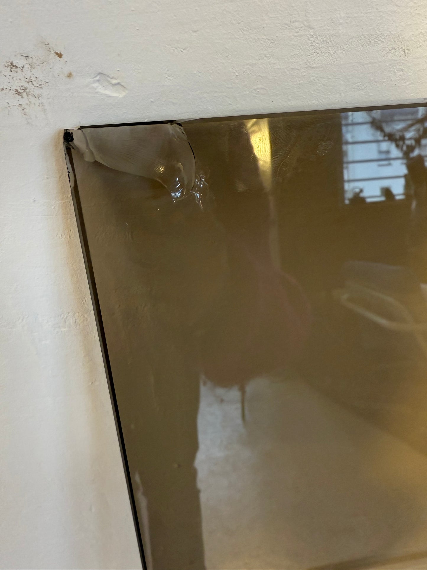 Table basse vintage laiton doré et verre fumé