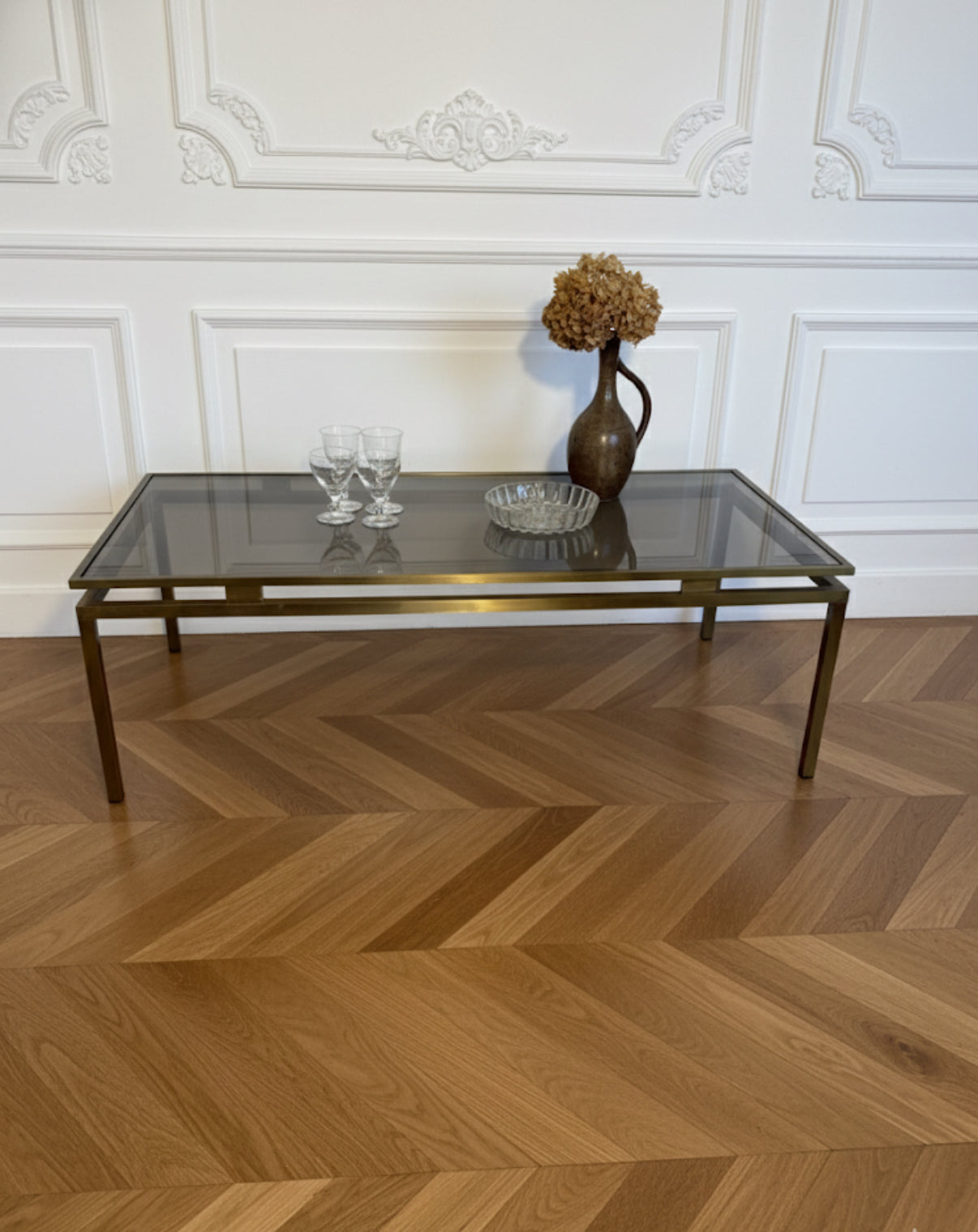 Table basse vintage laiton doré et verre fumé