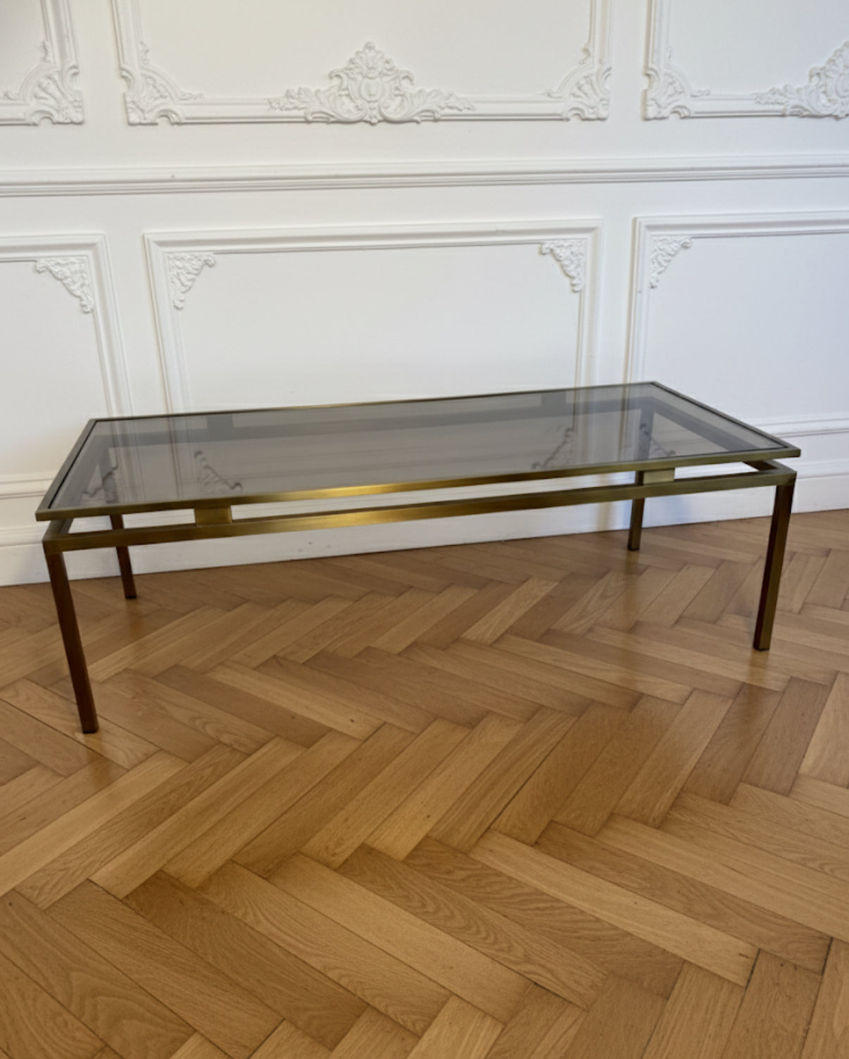 Table basse vintage laiton doré et verre fumé